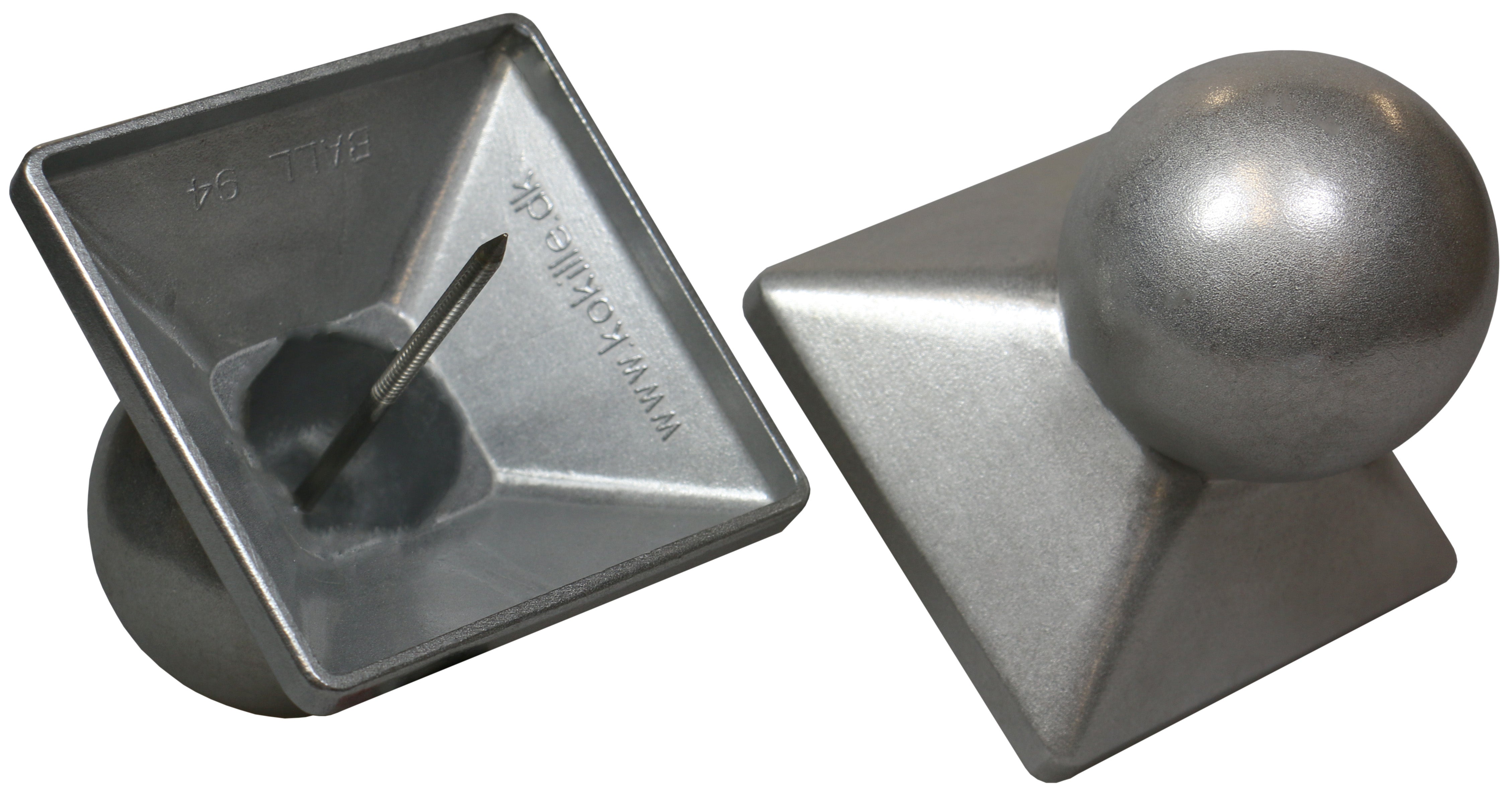 Introducing the Quick Cap Aluminum: This set includes two silver cast aluminum post caps with pyramid tops and spherical finials. One cap sits upright displaying its smooth surface, while the other is flipped to show its base with a screw for easy attachment.