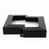 The 6x6 Double Bundle - White/Black is a black zinc-coated metal bracket with a cut-out center and vertical mounting tabs. Its designed as a Titan Wood Post Anchor with a smooth finish, elegantly displayed against a white background.