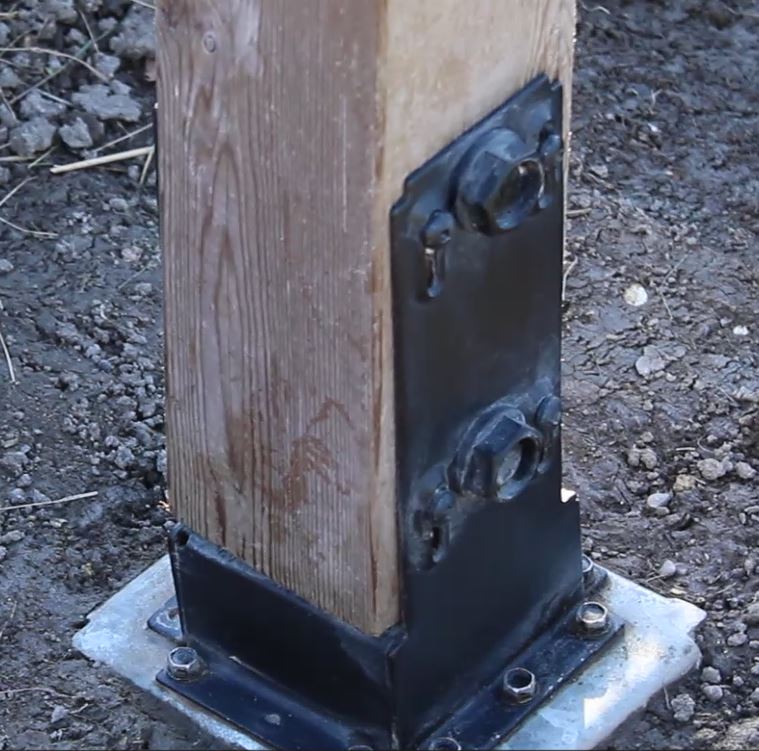 Fence Foot Anchor installed outdoors