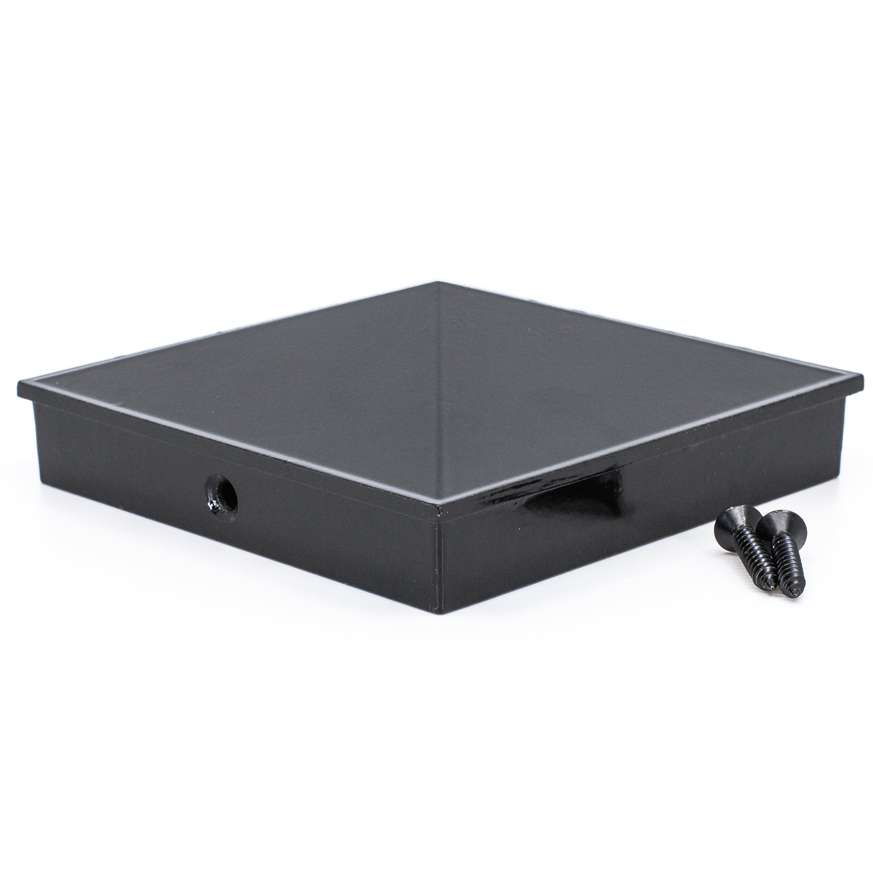 A glossy black, square metal cap from the 4x4 Triple Bundle - White/Black is shown on a white background. Echoing the Metal Post Skirts design, it has a hollow square base and solid top, accompanied by two black screws.
