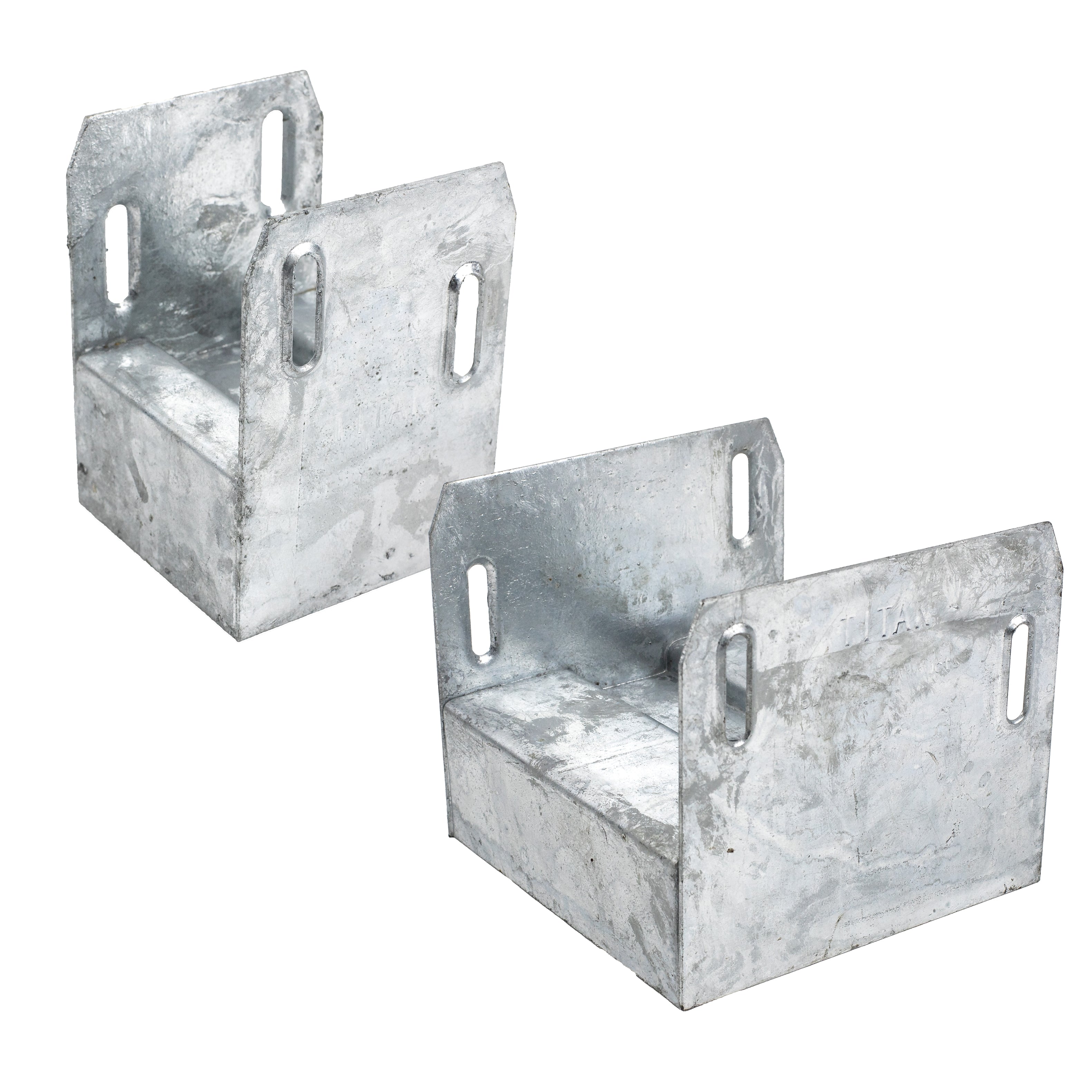 Two Deck Foot - Floating - Ground Contact brackets, made of galvanized metal with rectangular bases and vertical sides featuring slotted holes for fastening, appear sturdy and ideal for freestanding decks or mounting applications. The brackets are positioned at slight angles.