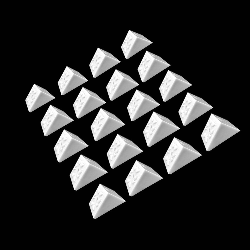 White pyramid-shaped objects, similar to Snapn Lock™ Stair Adapters Square, are meticulously arranged in a grid pattern against a black background.