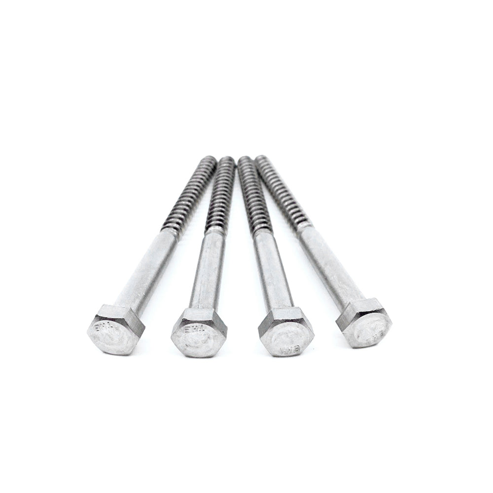 Four 3/8x5 Stainless Hex Head Lag Screws are arranged side by side on a white background, ideal for use with Titan Wood Post Anchors.