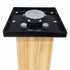 The Hammer Tool - 44 is a black metal adjustable 4x4 post base with a square plate for wooden beams. Ideal for builders, it includes bolts and a central round metal adjuster to fine-tune height. The background is white.