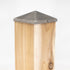 This wooden post features a Titan Wood Post Anchor and is elegantly crowned with a Pyramid Metal Post Cap. The visible wood grain contrasts beautifully with the gleaming metal cap against a simple white background.