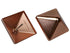 Two copper-colored, pyramid-shaped studs are shown. One is upside down displaying a pointed back while the other shows a smooth top surface. Reminiscent of Quick Cap Aluminum, they infuse fashion or design with an edgy flair, much like stylish cast aluminum post caps.