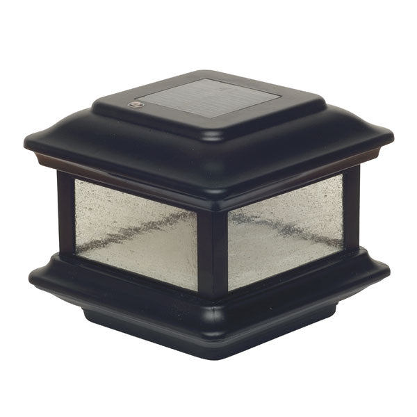 The Classy Post Cap Colonial Solar light features pebbled glass panels on four sides, a solar panel on top, and durable cast aluminum construction. Its black design makes it ideal for outdoor use on deck or fence posts, blending elegance with functionality.