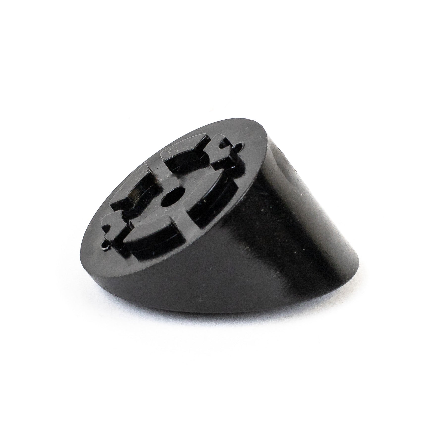 A black plastic Snapn Lock® Stair Adapter, cone-shaped with a circular hole pattern, possibly a furniture leg cap or stopper, rests against a pristine white background.