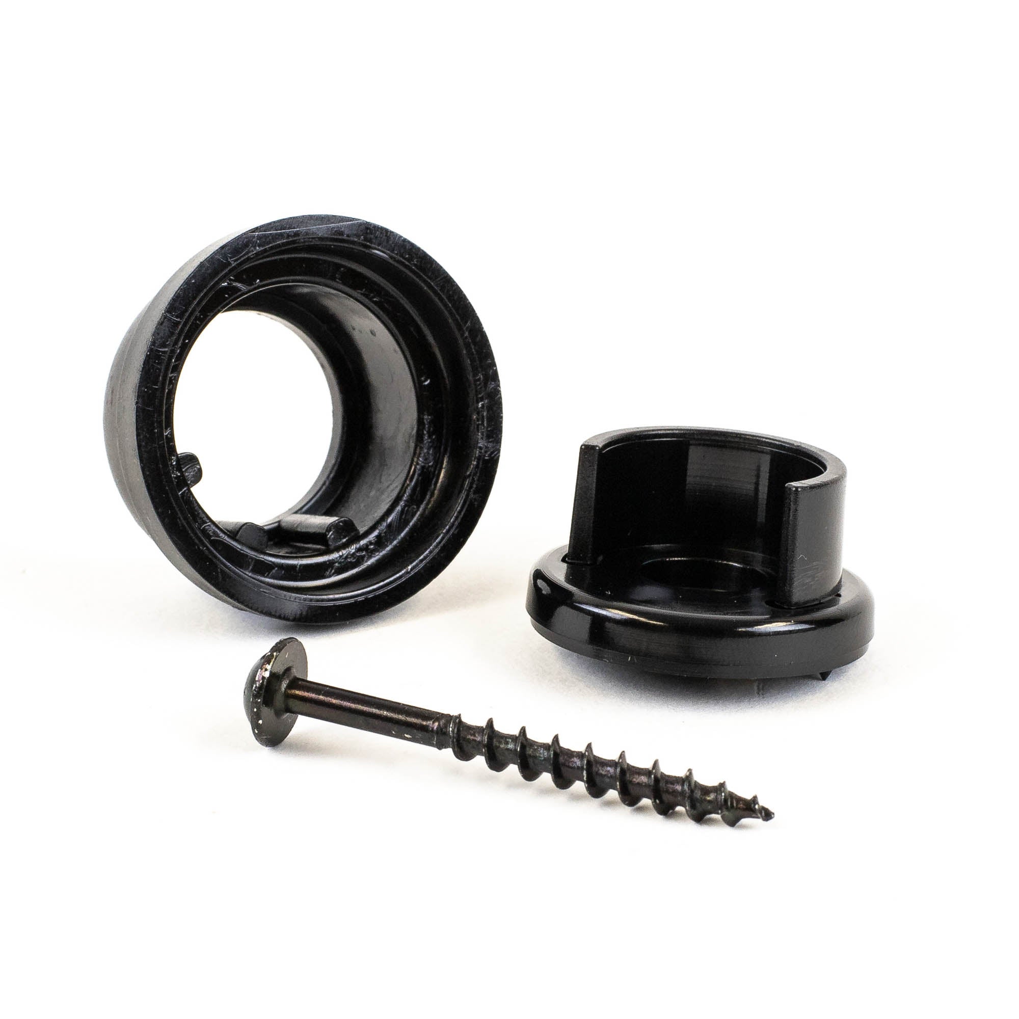 A black circular plastic object, disassembled into two pieces with a silver screw in front, showcases the polycarbonate durability of Snapn Lock® Baluster Connectors Round 20 Pack. The objects rest on a plain white background.