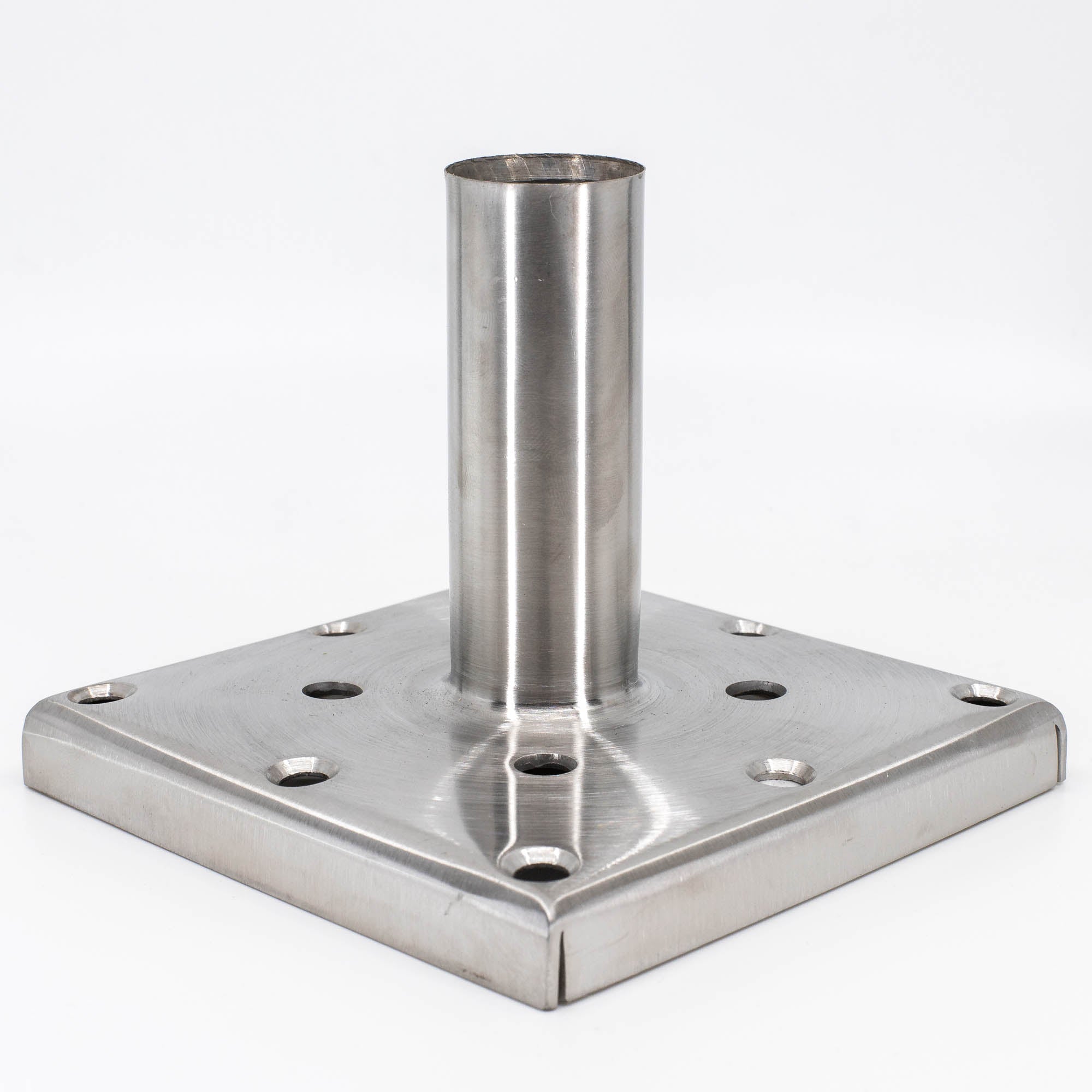 The Post Anchor Single features a stainless steel square base with a raised cylindrical tube in the center, perfect for surface mounting. Its multiple holes ensure secure attachment, while the smooth and reflective finish adds elegance to any project.