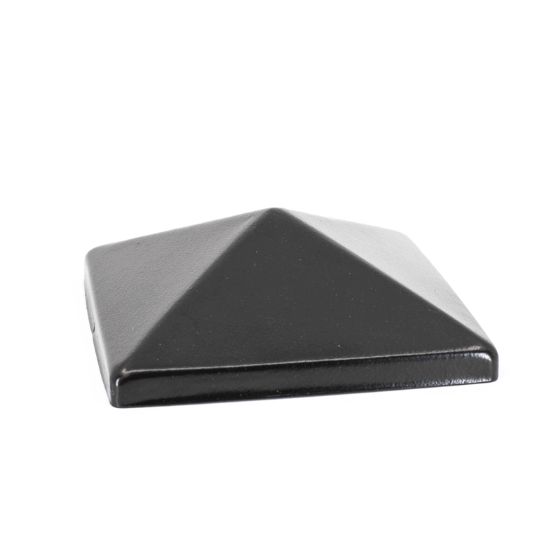 A sleek, black, pyramid-shaped object resembling the Pyramid Metal Post Cap sits elegantly on a smooth, glossy white background.