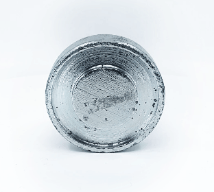 A circular, silver metal cap with a slightly textured surface and wear marks evokes the rugged durability of 4x4 post anchors, set against a white background. Product: Hammer Tool - 44.