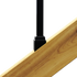 A Snapn Lock® Stair Adapter Plus black metal square connector is attached to a light wood plank, highlighting the woods grain against a solid black background.