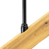 Close-up of a Snapn Lock® Stair Adapter Plus Connector Pack in black, attached at an angle to a light-colored wooden plank. The wood grain is visible, suggesting integration into a railing system or furniture piece.