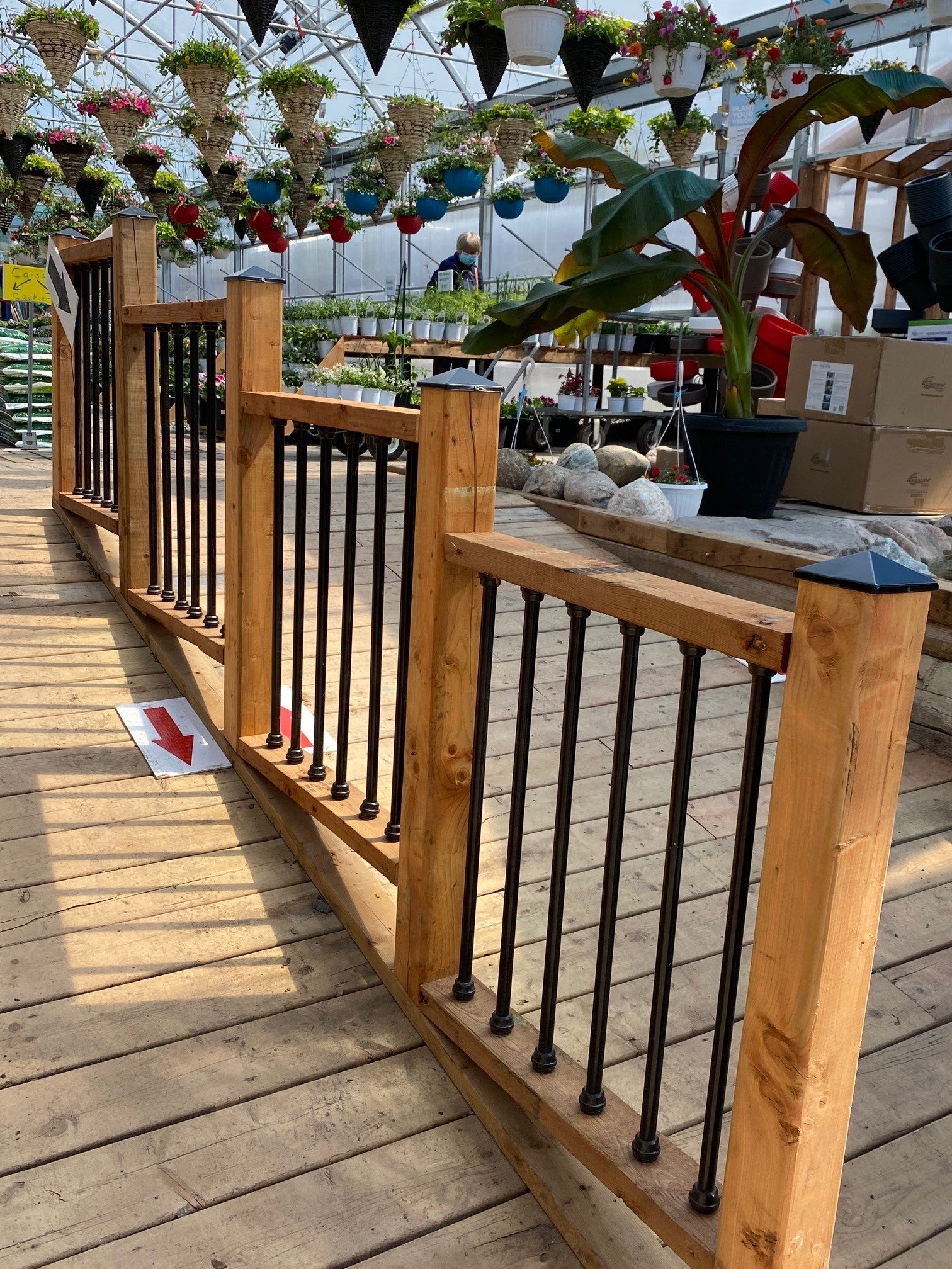 accessibility ramp wood railing in a greenhouse